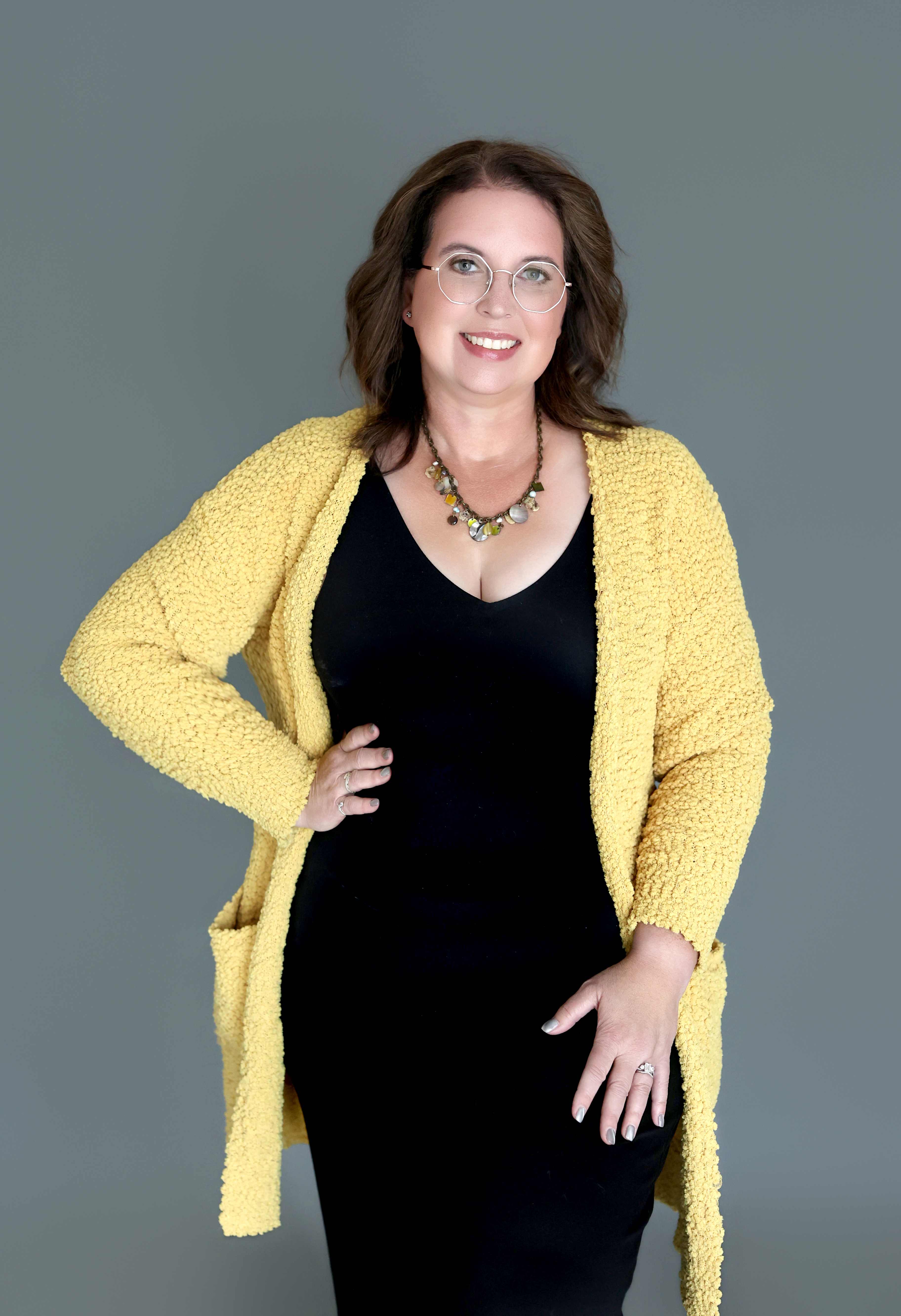 Karen Kay Smith in a yellow cardigan